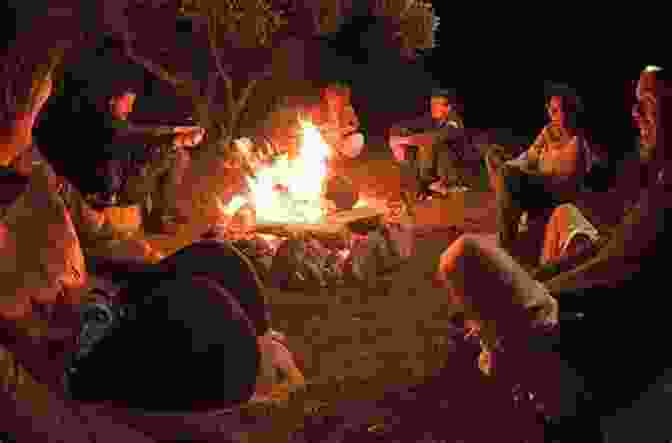 A Group Of People Gathered Around A Campfire, Sharing Stories And Laughter In The Warm Glow Of The Evening Living In The Broken West: Essays