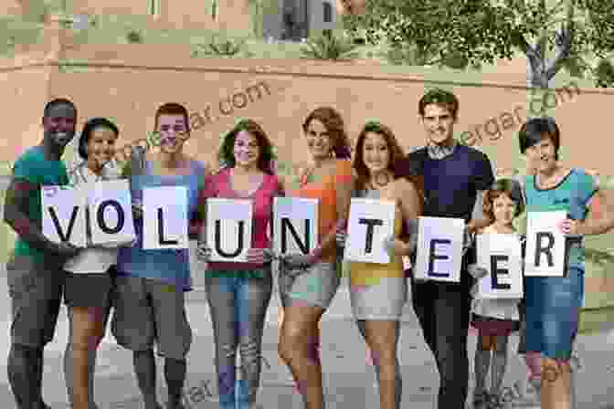 A Group Of Volunteers Working Together Divine Merger: What Happens When Jesus Collides With Your Community